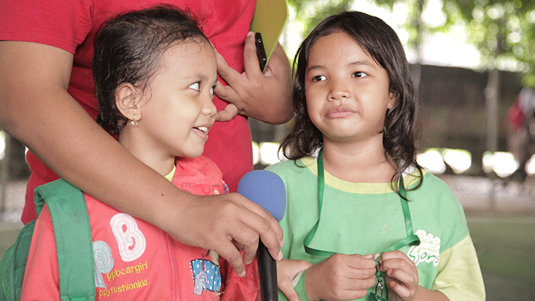 Children taking turns to share their dreams at Inspiration Factory Foundation